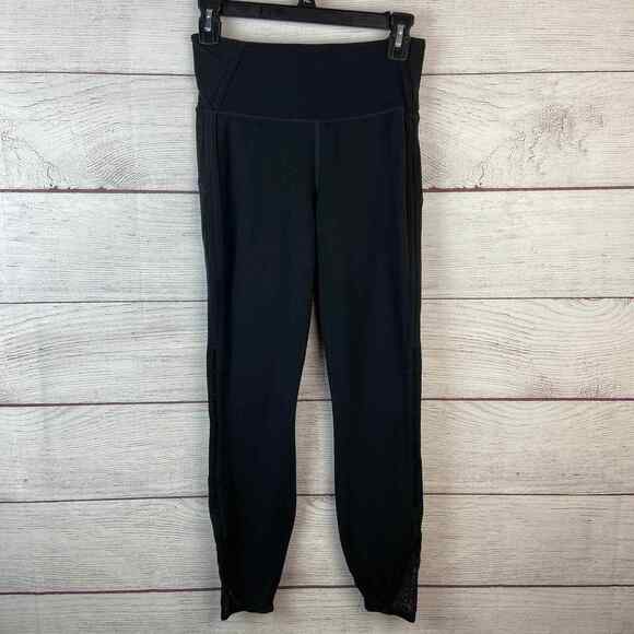 Athleta black 25 inseam mesh detail design around the calf/ankle size S - Picture 1 of 8